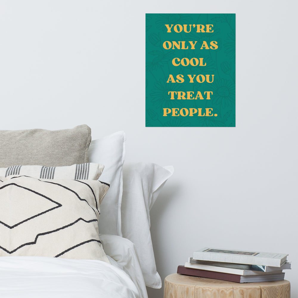 "You're Only As Cool As You Treat People"" mental health poster displayed on a wall, creating a motivating and uplifting atmosphere for therapy offices or home decor.